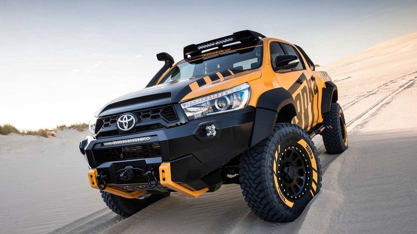  Toyota Hilux on a desert dune 